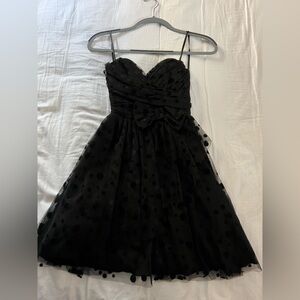 dELiA’s black strapless mini dress